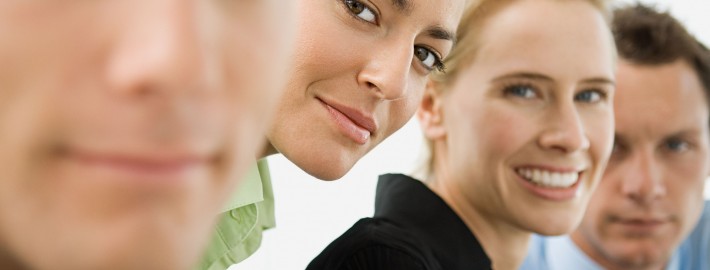 Portrait of four office workers